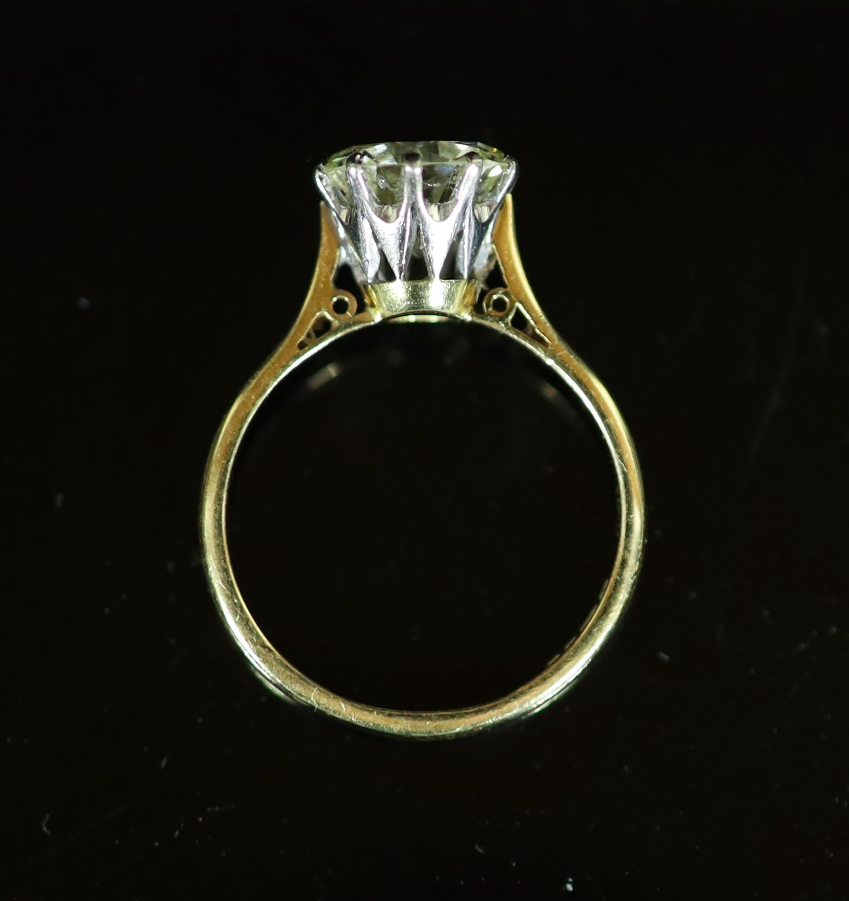 An 18ct gold and solitaire diamond ring